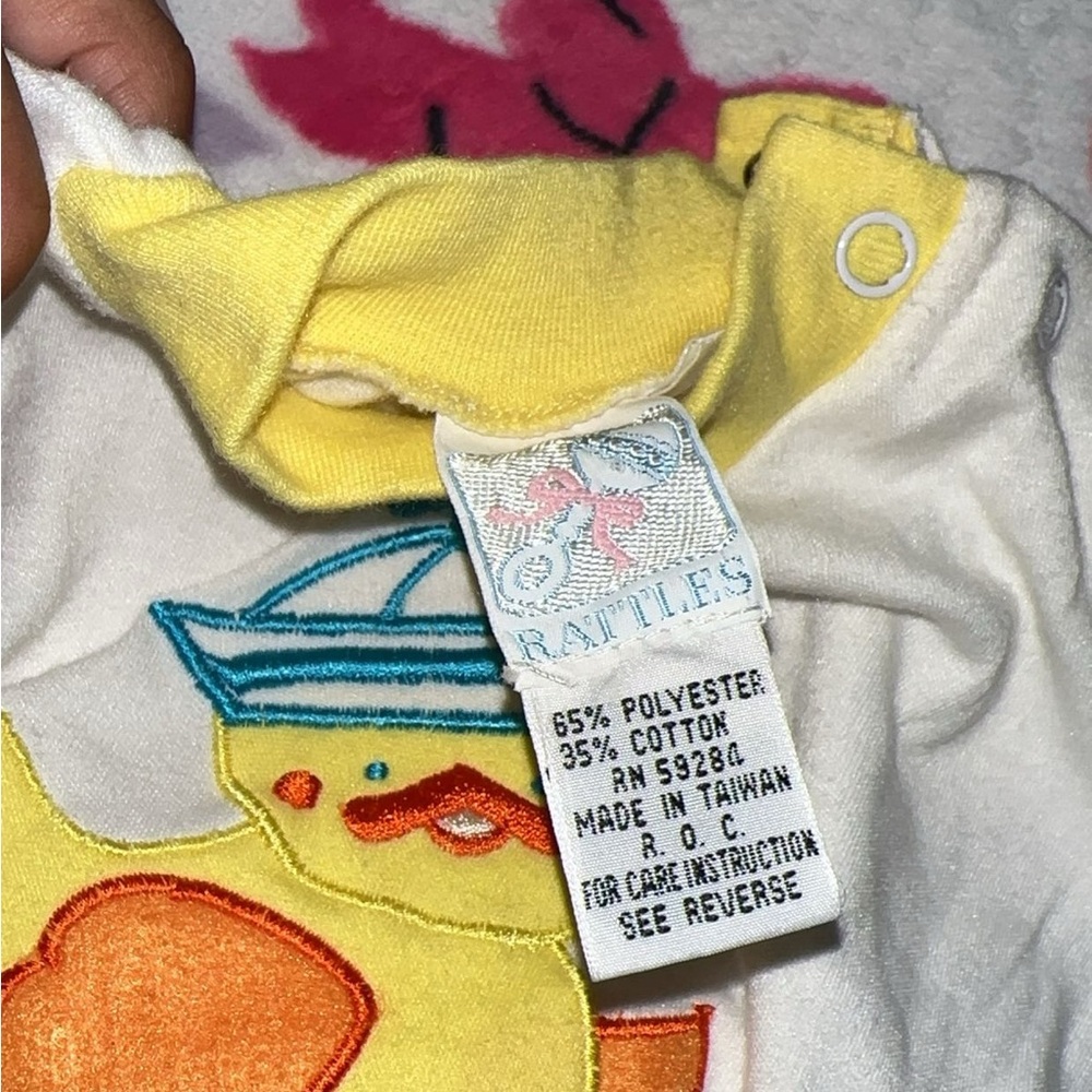 Yellow and White Baby Onesie with Duck Design